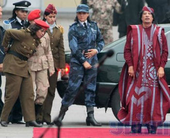 Gaddafi with his Amazons.